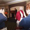 Coach Meyer receives a standing ovation as he finishes.