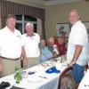 Member Tom Giles (center) and guest introductions.