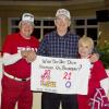 LSU fan, A.J. Benintende is flanked by the Rolling Tide of Bud and Barb Patty.